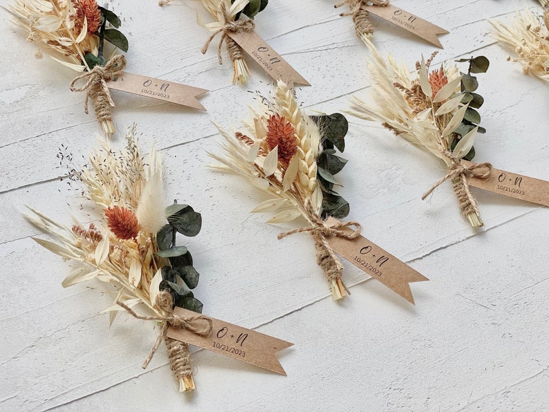 Elevate your rustic boho wedding with our mini dried flower bouquets, customizable in colors and flower types. These everlasting dried flowers add a unique touch to your special day.