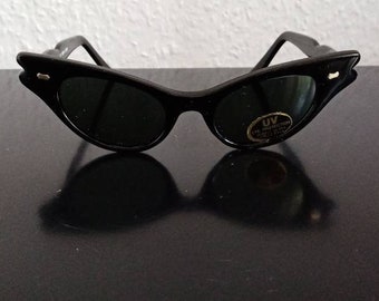 Markante breite runde Sonnenbrille aus Acetat Kunststoff schwarz im cateye Stil