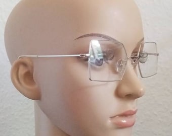 Kleine feine rechteckige Brille aus Metall silberfarben