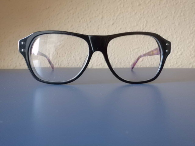 black plastic glasses in aviation style