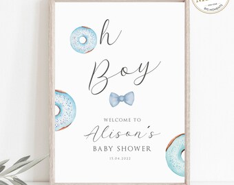 Puede incluir: Un cartel de baby shower con temática de donas azules y blancas con el texto "Oh Boy" y una corbata de lazo azul. El cartel también incluye el texto "Bienvenido a la fiesta de bienvenida de Alison 15.04.2022".