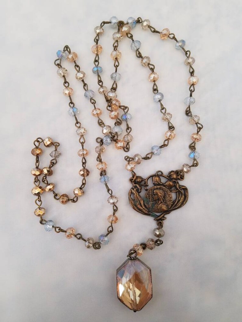 Bronze and crystal long necklace Rosary style necklace Virgins Saints and Angels inspired. Tudor style Religious Vintage crystal pendant