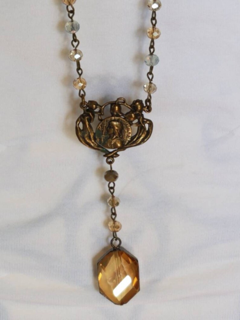 Bronze and crystal long necklace Rosary style necklace Virgins Saints and Angels inspired. Tudor style Religious Vintage crystal pendant