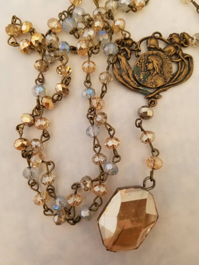 Bronze and crystal long necklace Rosary style necklace Virgins Saints and Angels inspired. Tudor style Religious Vintage crystal pendant