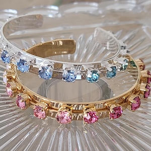 Cuff Bangle Bracelets. Adjustable Swarovski crystal bracelets. Shiney gold and silver bracelets. Pink and Blue Ombre bracelets. Love Bangles