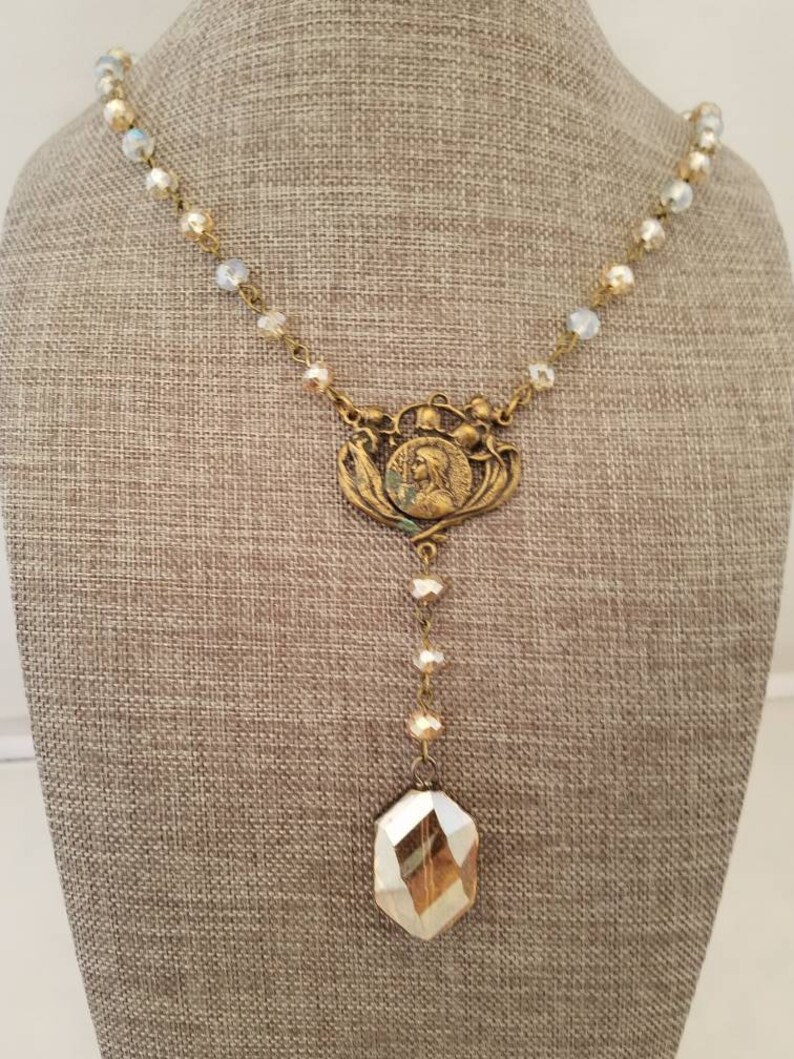 Bronze and crystal long necklace Rosary style necklace Virgins Saints and Angels inspired. Tudor style Religious Vintage crystal pendant