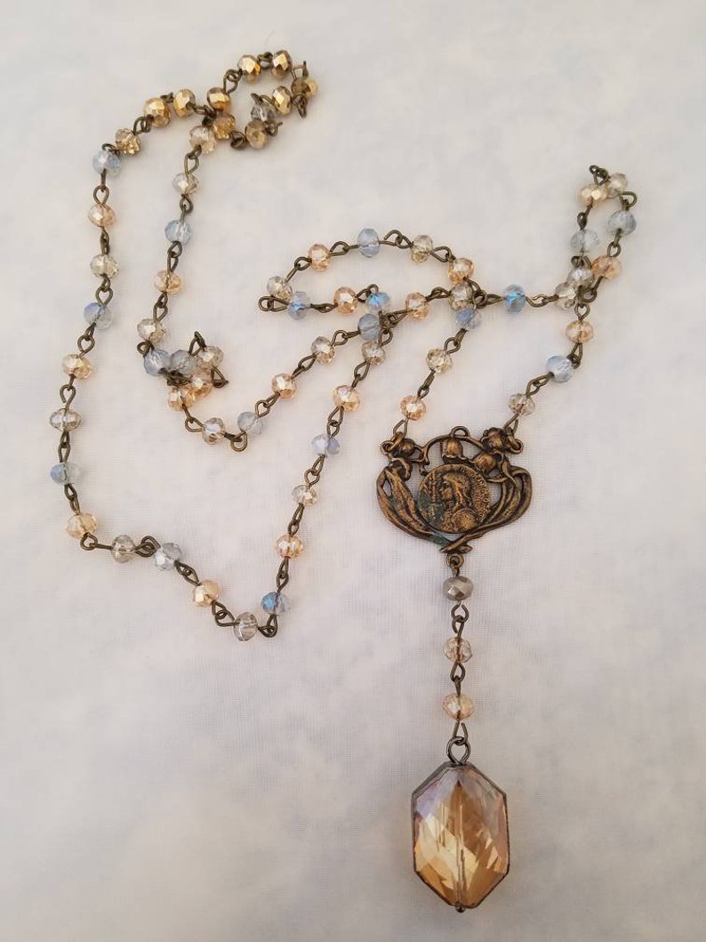 Bronze and crystal long necklace Rosary style necklace Virgins Saints and Angels inspired. Tudor style Religious Vintage crystal pendant