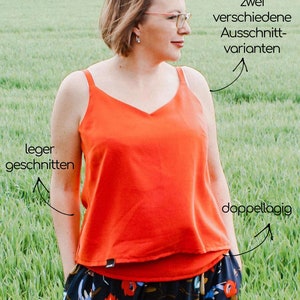 May include: A red spaghetti strap top with a V-neckline. The top is loose fitting and has a double layer. The text "Malaga - Spaghetti-Top Mix & Match Kollektion" is visible at the top of the image. The text "zwei verschiedene Ausschnitt-varianten" is visible on the right side of the image. The text "leger geschnitten" is visible on the left side of the image. The text "doppellagig" is visible on the right side of the image.