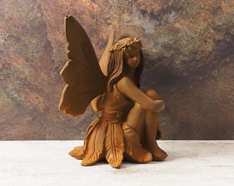 Cast Iron Sitting Fairy Statue with Natural Rust Finish – Garden Decor
