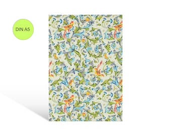 May include: A decorative A5-sized paper with a repeating pattern of birds, flowers, and foliage in shades of green, blue, yellow, and red. The design has a vintage aesthetic. A lime green circle with the text "DIN A5" is in the upper left corner.