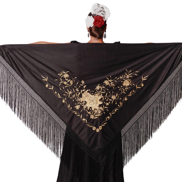 Black triangular flamenco shawl with fringes. Gold embroidery on one side. Large 190X90cm without counting the fringes that measure 30cm.
