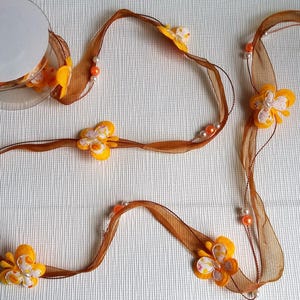 Geschenkband 5 Rollen à ca. 3m mit Perlen + Schmetterlingen braun orange neu