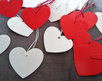 20 paper hearts Hearts made of red or white cardboard on a cord