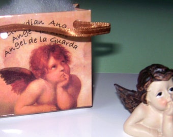 Guardian angel in gift bag Height of bag without handle 6 cm Height of angel 4 cm