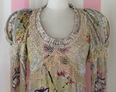 Devoré floral velvet long sleeved boho dress adorned with butterfly appliqués and Elizabethan shoulder rolls.