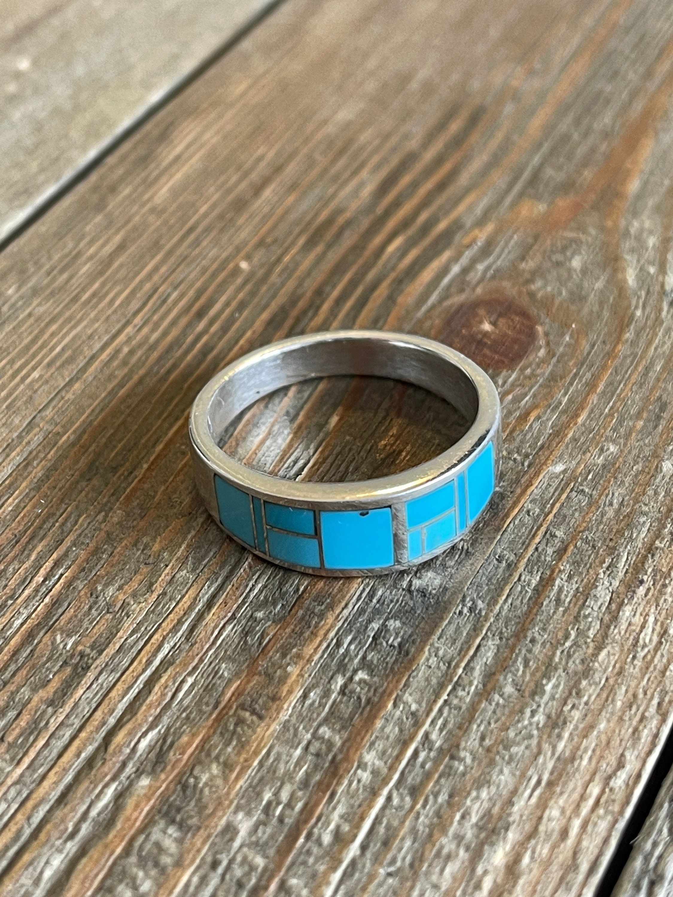 Silver ring with turquoise inlay deals