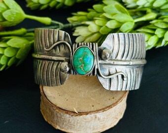 ナバホ族のスターリングシルバーとソノラ山脈のターコイズのカフ