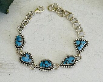 Zuidwest gemaakte Golden Hills turquoise en sterling zilveren armband