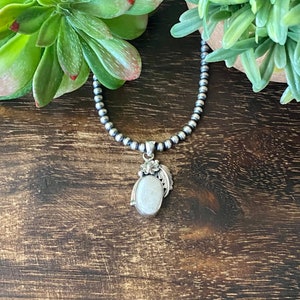 Navajo Made White Buffalo & Sterling Silver Pendant