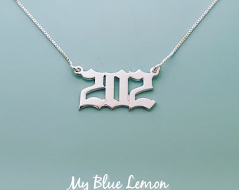 Naszyjnik z cyfrą ze srebra próby 925: biżuteria z personalizowanym kodem kierunkowym