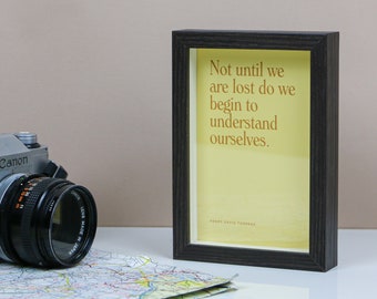 Not until we are lost do we begin to understand ourselves Quote by Henry David Thoreau in Frame