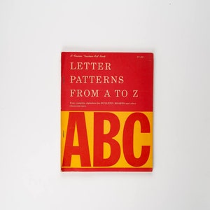 May include: A red book with the title "Letter Patterns From A to Z" and the word "ABC" in large yellow letters.