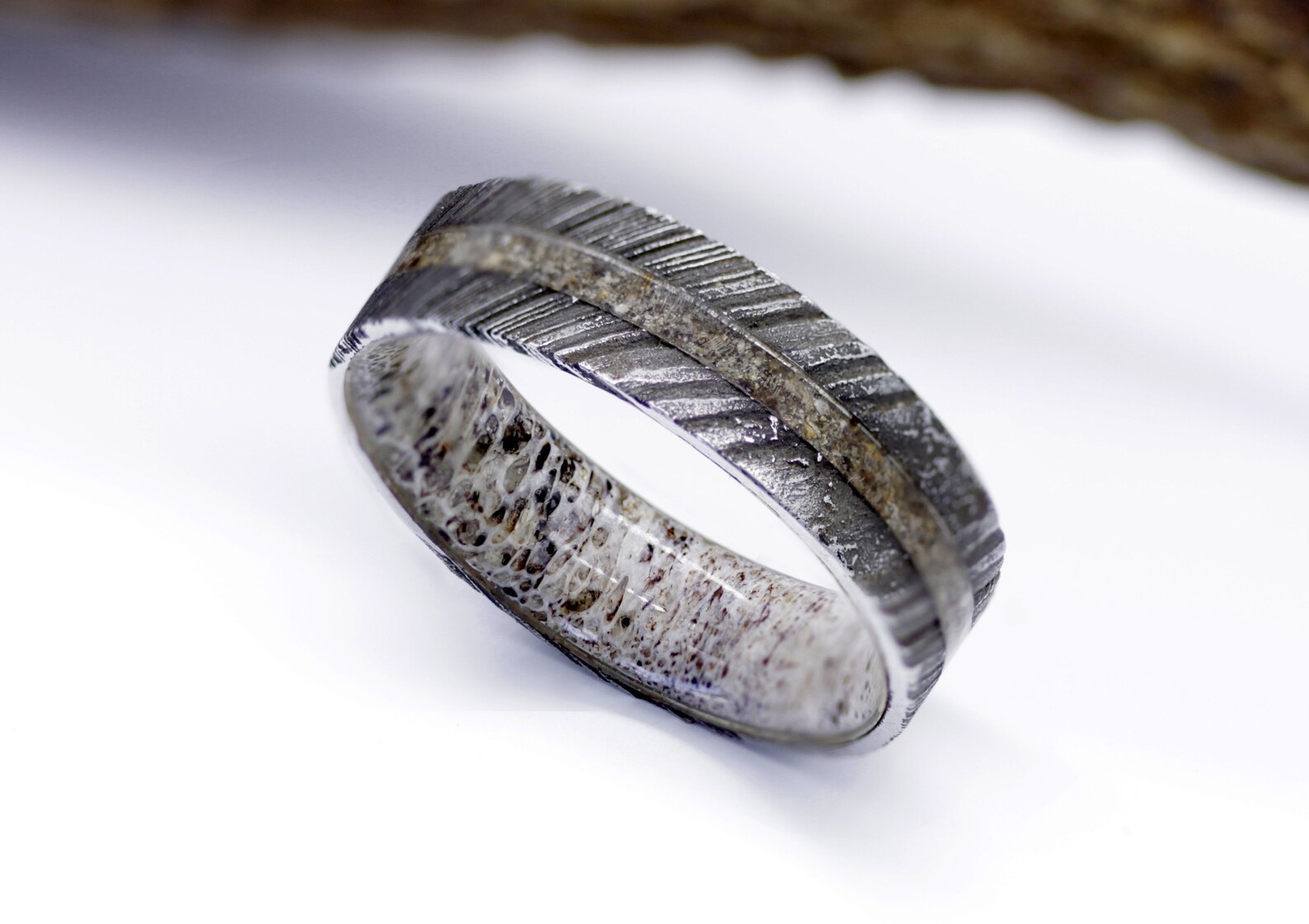 Dinosaur fossil ring Damascus wedding band lined with