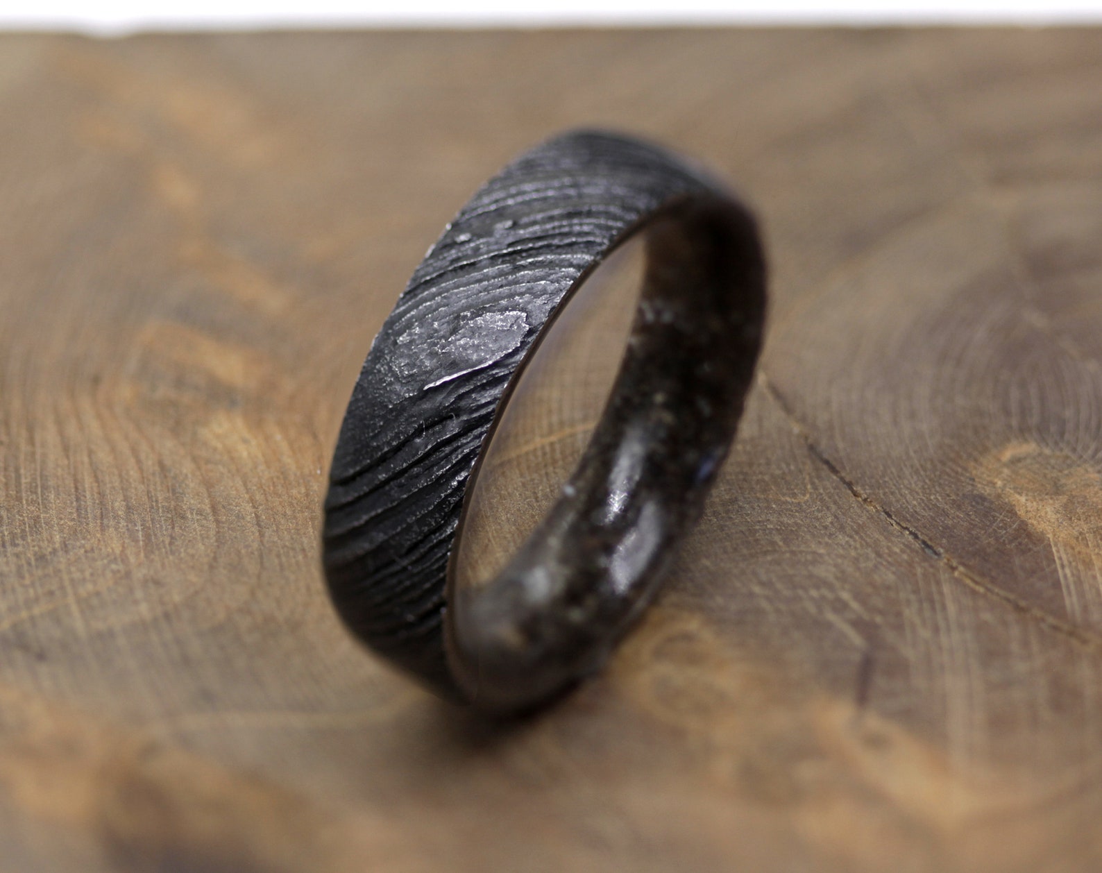 Dinosaur fossil ring Damascus steel wedding band for man