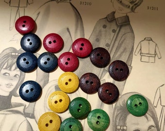 10 carved wooden buttons. Blue wooden button, yellow wooden button, red wooden button, green wooden button, brown wooden button