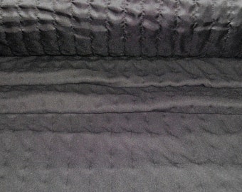 Double fabric quilted in black