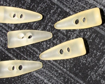 Bouton bascule forme corne 48 mm crème