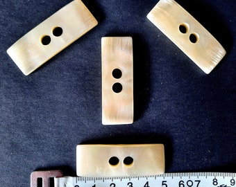 Knebelknopf rechteckig 50 mm creme