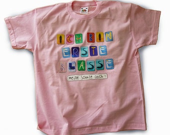 Erste Klasse T-Shirt, rosa, Gr. 128 / 134, für Schultüte / Schulanfang, BuchstaBilder Alfabet