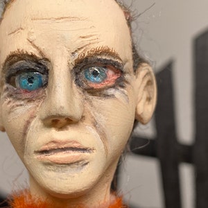 Dr. Lecter, in a bright orange prison styled jumpsuit, and mask, creepy doll, Hannibal, art doll, Halloween décor, handmade doll