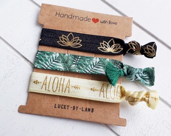 Lotus bracelet, hair tie, hairband, individualized, selection, printed, print, labeled, motif, symbol, loop, jungle