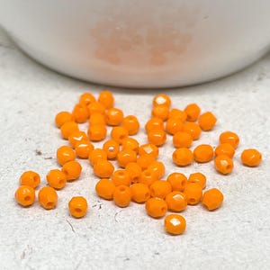 100 Bohemian cut glass beads, orange glass beads, opaque orange beads