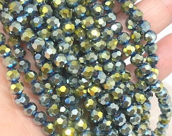 Glass beads 6 mm, cut glass beads, green iridescent