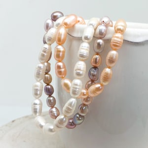 1 strand of freshwater pearls 8-12 mm x 7-8 mm, 38 pieces of cultured pearls cream white, lilac, peach, drop natural pearls, baroque pearls, real pearls