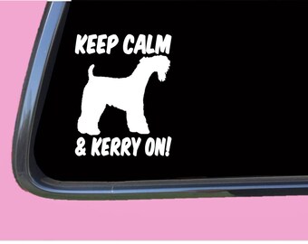 May include: White vinyl decal with a silhouette of a Kerry Blue Terrier dog and the text "Keep Calm & Kerry On!"