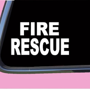 May include: White vinyl decal with the words "FIRE RESCUE" on a black background.