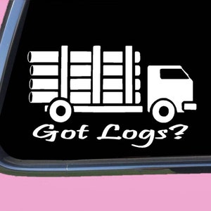 May include: White vinyl decal of a cartoon truck hauling logs with the text "Got Logs?" below.