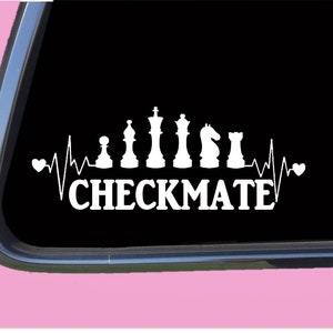 May include: White vinyl decal with a heart beat line and chess pieces, with the text "CHECKMATE" below.