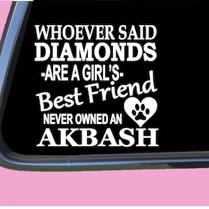 May include: White vinyl decal with the text "Whoever said diamonds are a girl's best friend never owned an Akbash" with a paw print inside a heart.