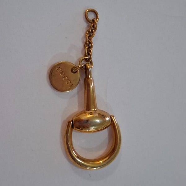 Raro colgante vintage Gucci con bocado de caballo chapado en oro