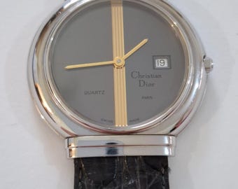 Reloj vintage Christian Dior de piel plateada para mujer, cuarzo suizo, caja original.