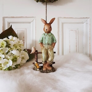 Nostalgischer Osterhase am Zaun - grün - Höhe 16 cm