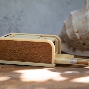 1952 rolinx cigarette dispenser for sale Novelty Cigarette Dispenser. Rolinx 600. Cream Bakerlite. 20 Cigarettes.  Brown Faux Leather. TC Jones Advertising. Vintage Decor C1950s