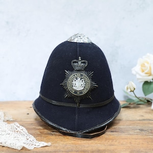 British Policeman's Custodian Rose Top Helmet: Police Uniform; 1960s Vintage Memorabilia