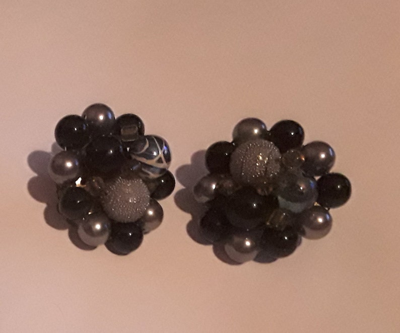 Two strand necklace and cluster clip earrings made in Japan Mark Japan on the back of the earrings and on the necklace clasp