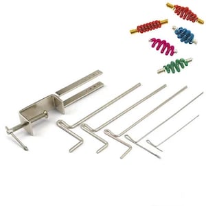 May include: A set of tools for making wire coils, including a clamp, a variety of metal rods, and a selection of colorful coiled wires.